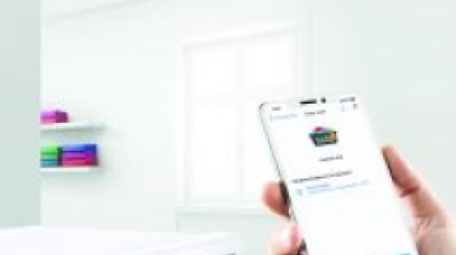 Smartphone App Home Connect steuert Waschmaschine. Foto: BSH